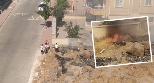 Arazide çıkan yangını çocuklar söndürdü