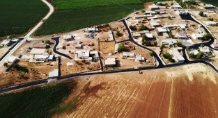 Viranşehir'de bir mahalle daha asfaltla buluştu