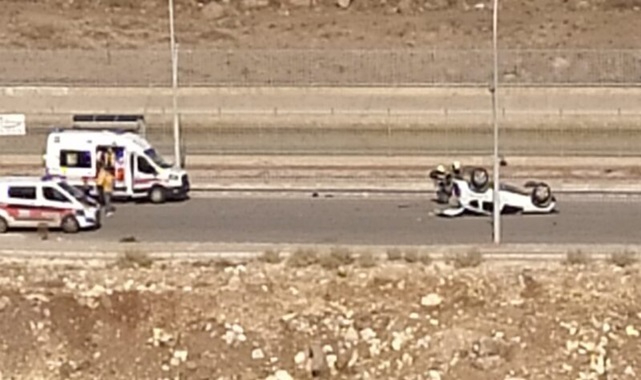 Takla atan araçtan yaralı kurtuldu