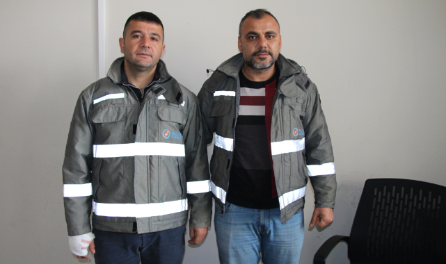 Baba ile oğlunu yanan tırdan kurtardılar