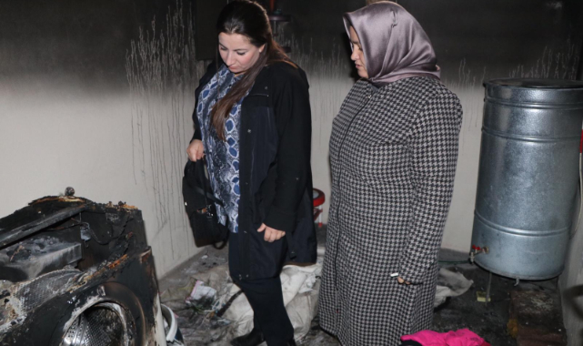 Başkan Ekinci'nin eşinden evi yanan aileye ziyaret