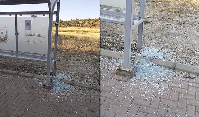 Kimliği belirsiz kişiler durak camlarını kırıyor