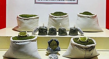 Mühimmat ve yüklü miktarda uyuşturucu madde ele geçiridi