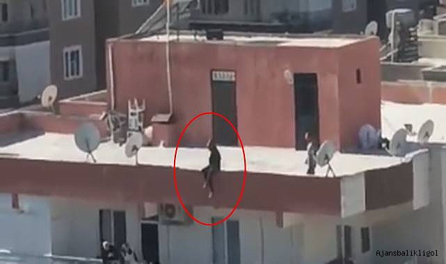 Binanın çatısına çıkarak atlamak üzereyken kurtarıldı