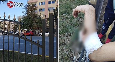 Kolu demir korkuluklara saplanan şahsın yardımına itfaiye yetişti