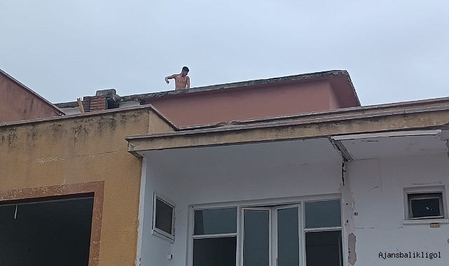 Urfa'da bir genç binanın çatısına çıkarak nişanlısını istedi!