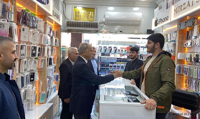 Hasan Kaplan esnafla kucaklaştı